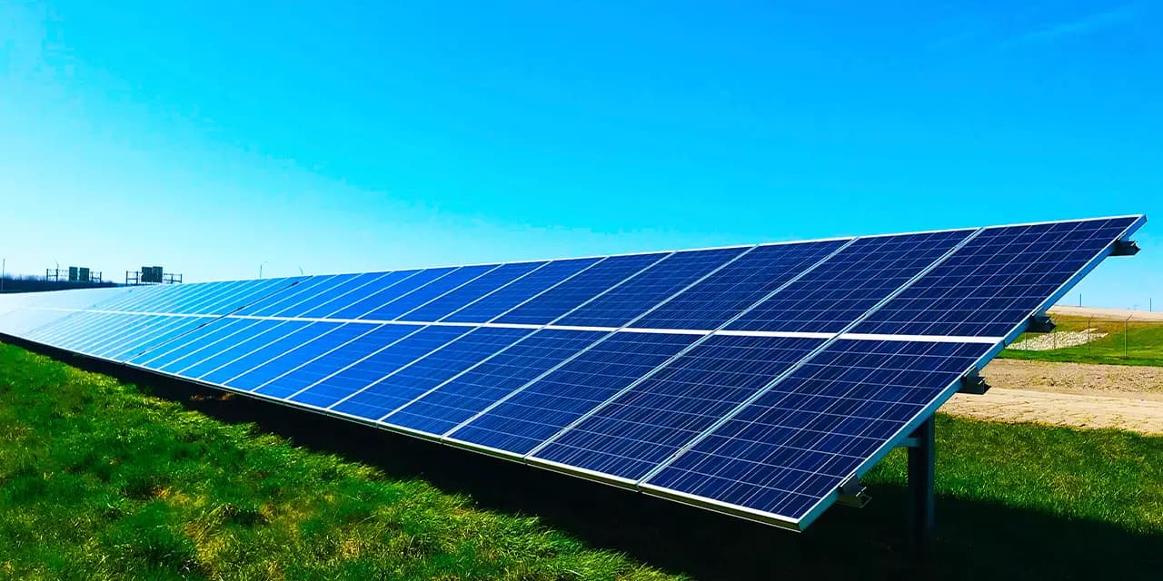 Company using solar energy panel to generate electricity for the company in a way that does not harm the environment