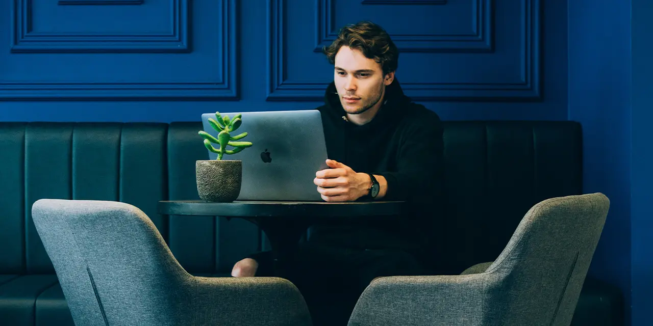 Marketer managing insights from his company's digital platforms