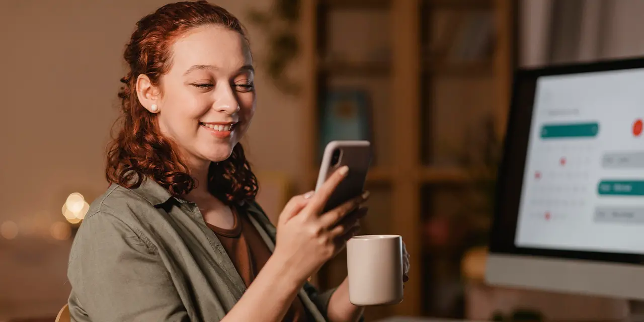 Woman accessing her digital business card through the clickcard app