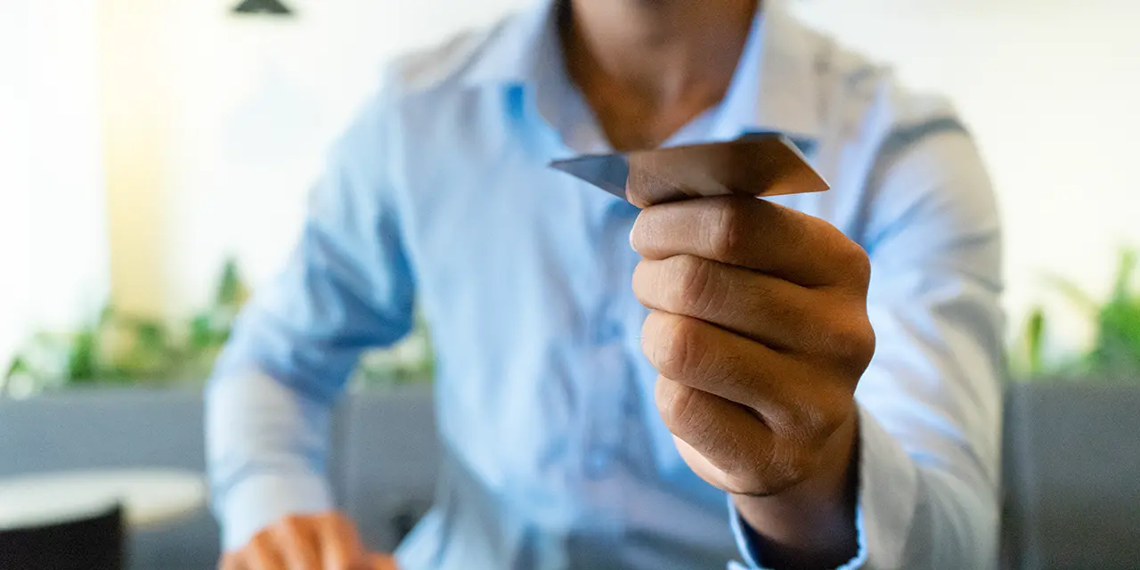 Professional using nfc card as digital business card to share their contact information.