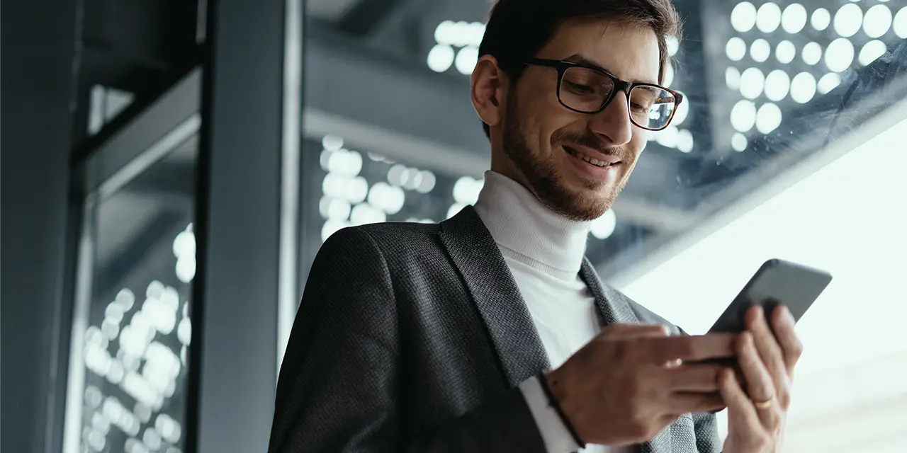 Happy professional creating your digital business card with ClickCard